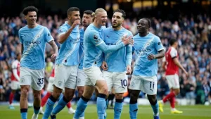 Manchester City beat Arsenal and close in on the title
