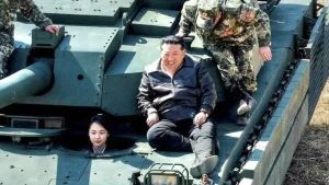 Kim Jong Un Appears on a Tank with His Daughter